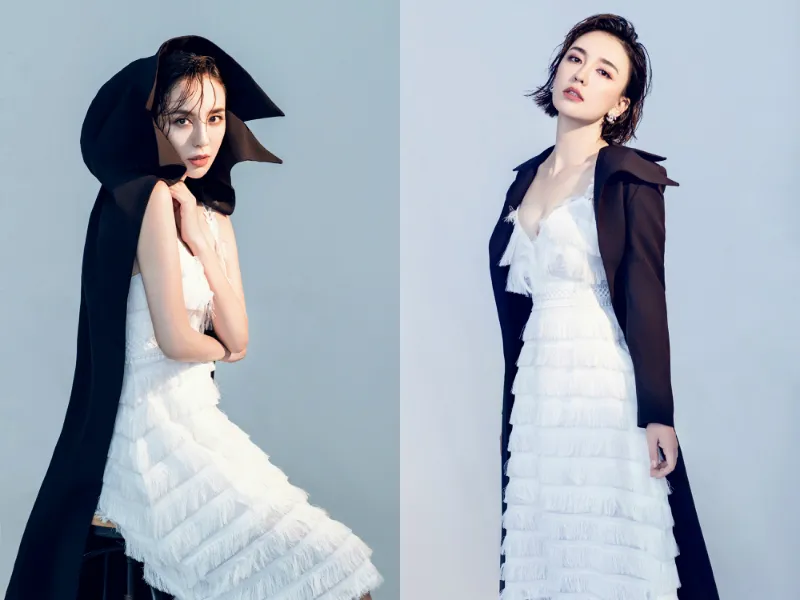 Jiarong Lv low-cut skirt with black trench coat: fashion can't hide it. JPG