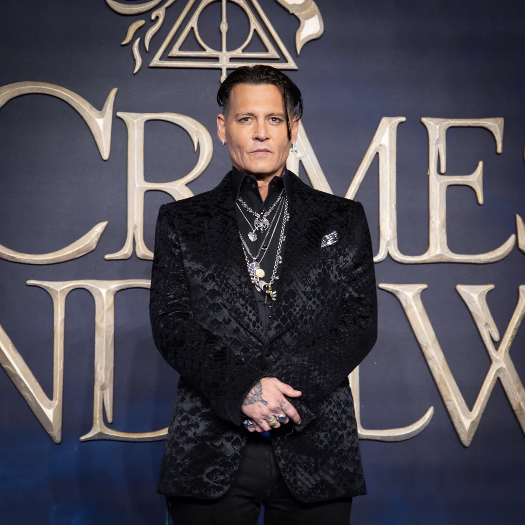 Johnny Depp makes his first appearance at the premiere. JPG