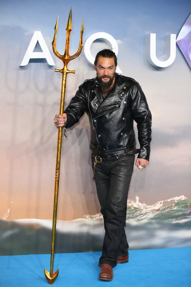 Jason Momoa showed up with a trident in his hand. JPG