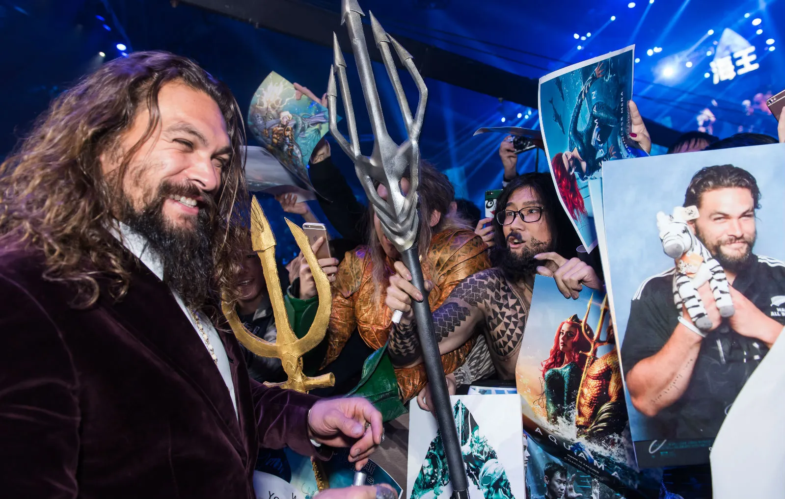 Jason poses with fans dressed as Aquaman. JPG