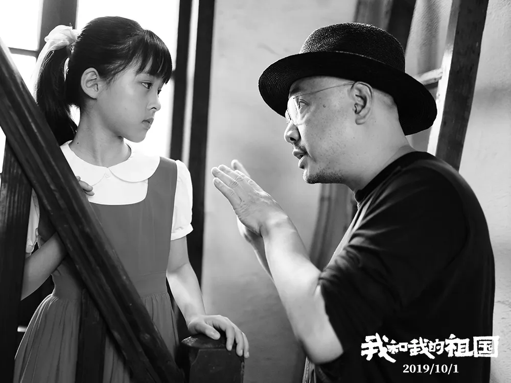 1000-6 Xu Zheng (actor) 导演耐心给小演员讲戏.jpg